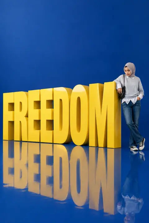 Big word poster example 2: the result (Yellow · Mirror letters · English · FREEDOM)